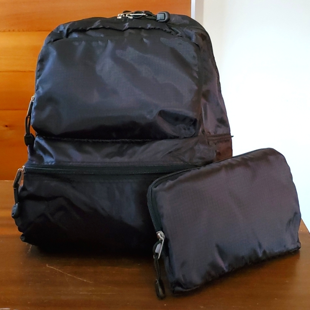 Convertible Backpack Black Folds into Pouch Zipper Pocket Rip Stop Travel Adjust